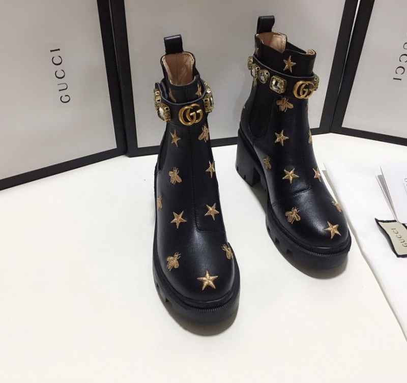 G*u*i boots